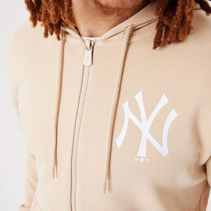 The Male model is wearing New York Yankees MLB League Essential Light Beige Full-Zip Hoodie 7