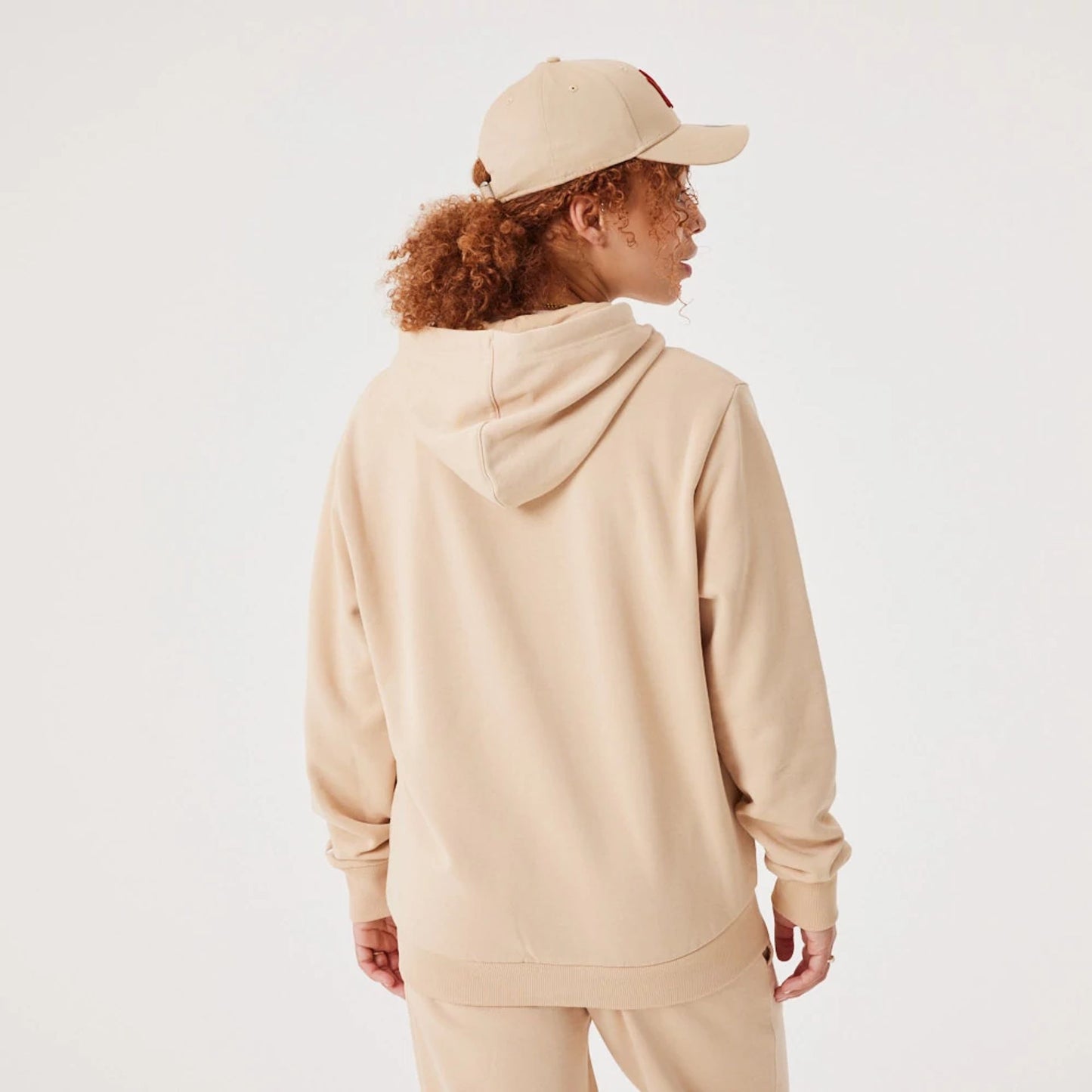 The Male model is wearing New York Yankees MLB League Essential Light Beige Full-Zip Hoodie 10