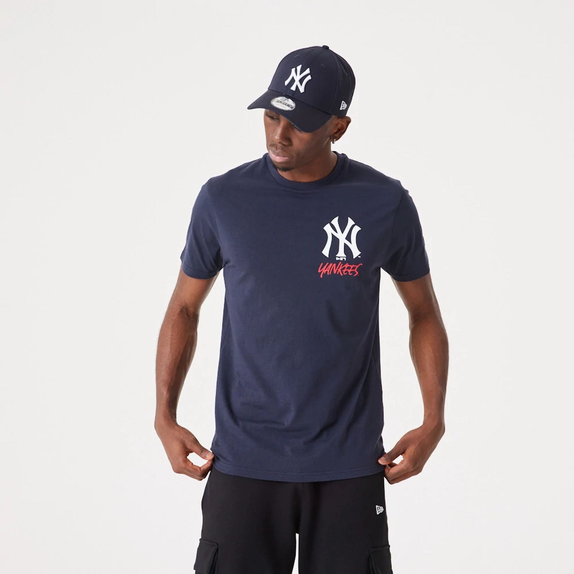 The Male model is wearing New York Yankees MLB Team Logo Graphic Navy T-Shirt 1