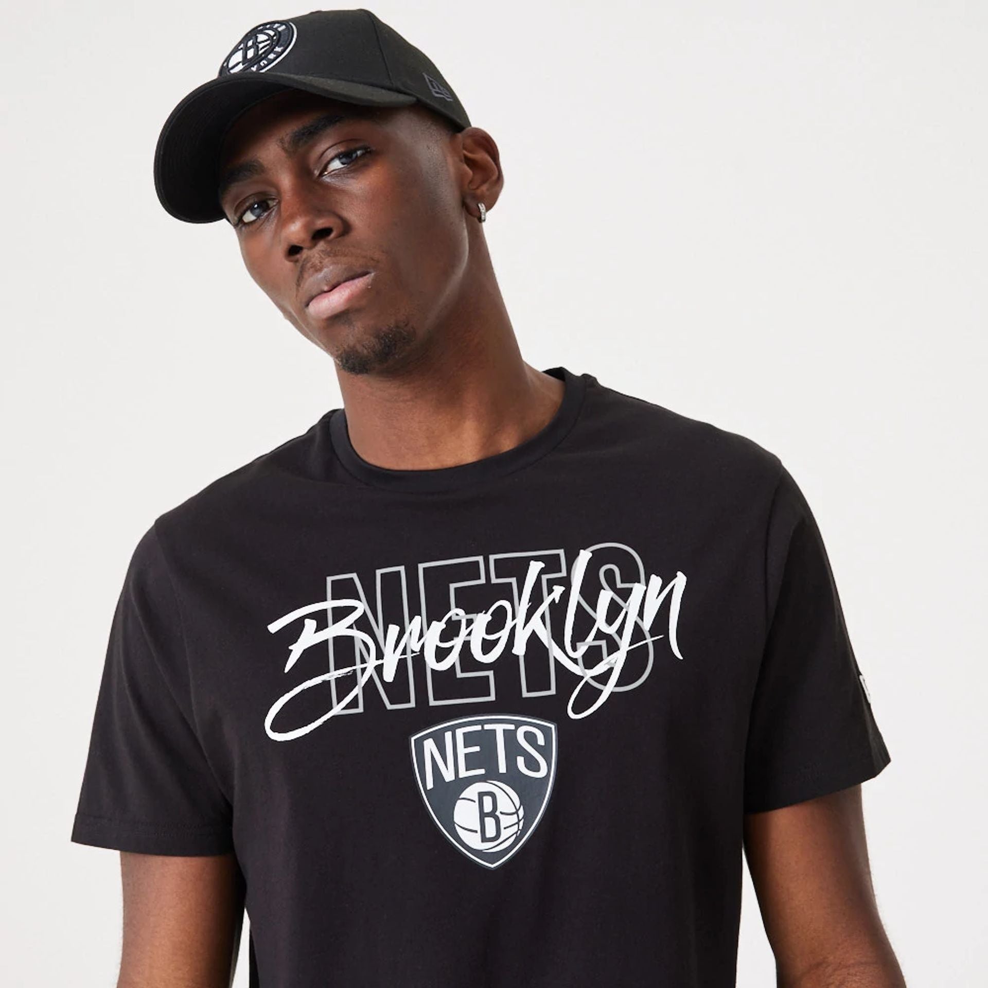 The Male model is wearing Brooklyn Nets NBA Script Black T-Shirt 1