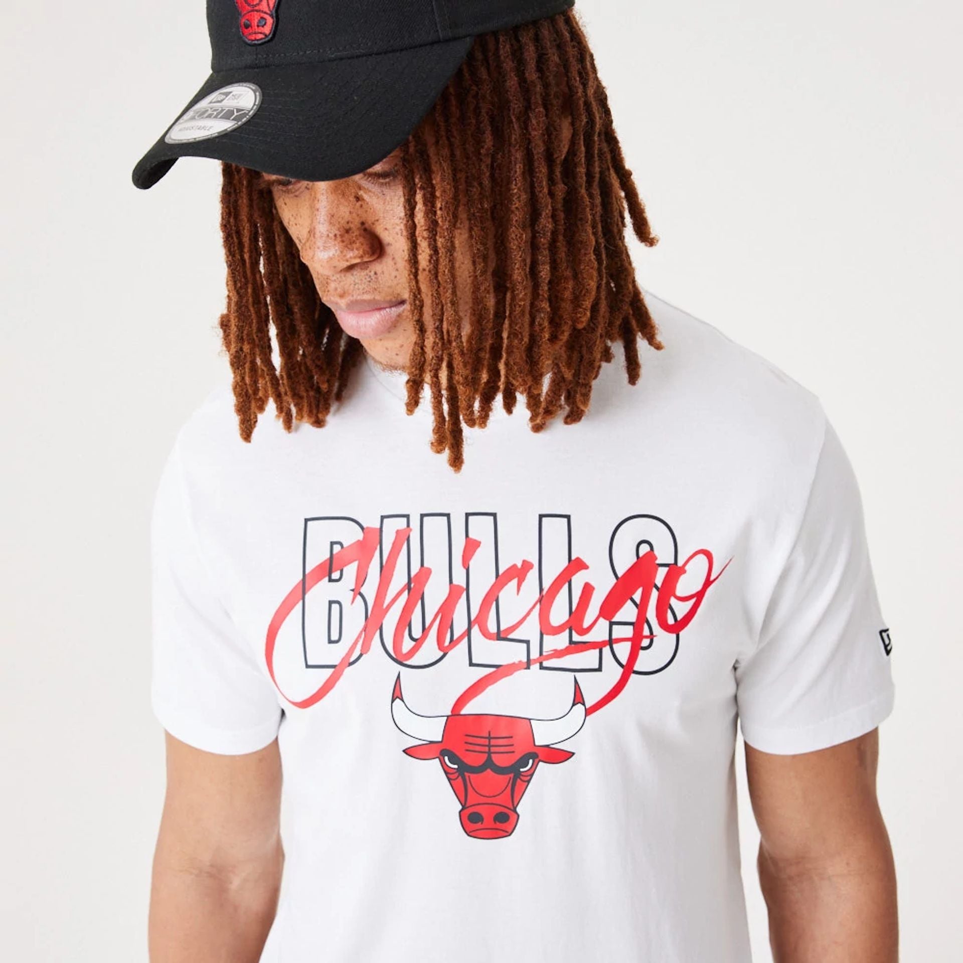 The Male model is wearing Chicago Bulls NBA Script White T-Shirt 2