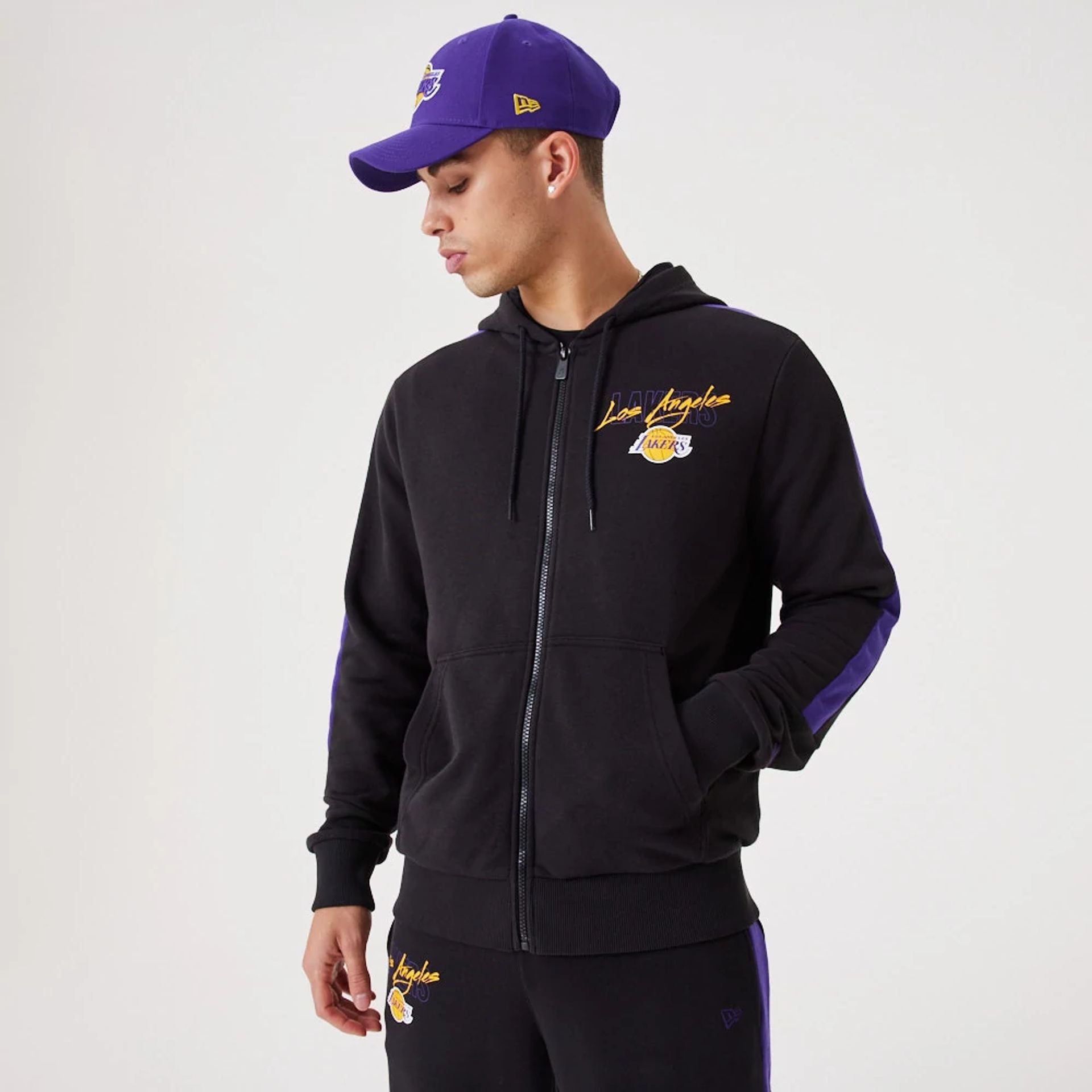 The Male model is wearing LA Lakers NBA Script Black Full-Zip Hoodie 1