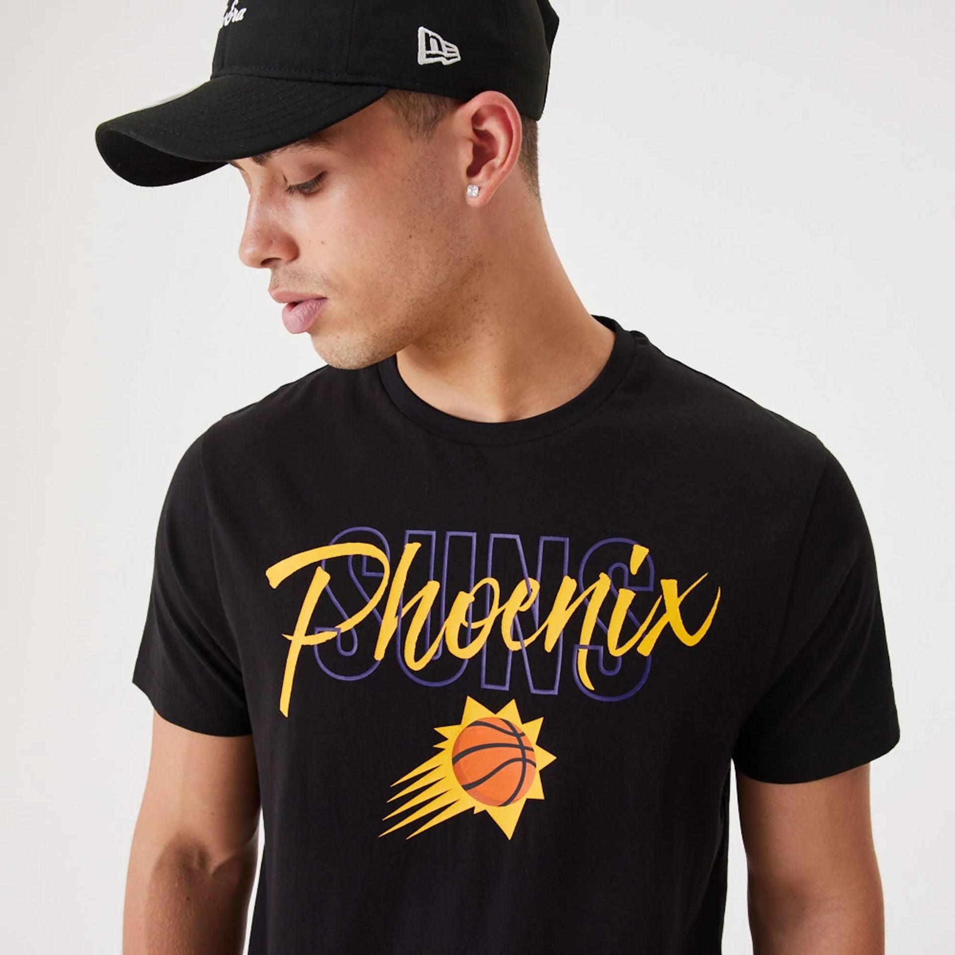 The Male model is wearing Phoenix Suns NBA Script Black T-Shirt 2