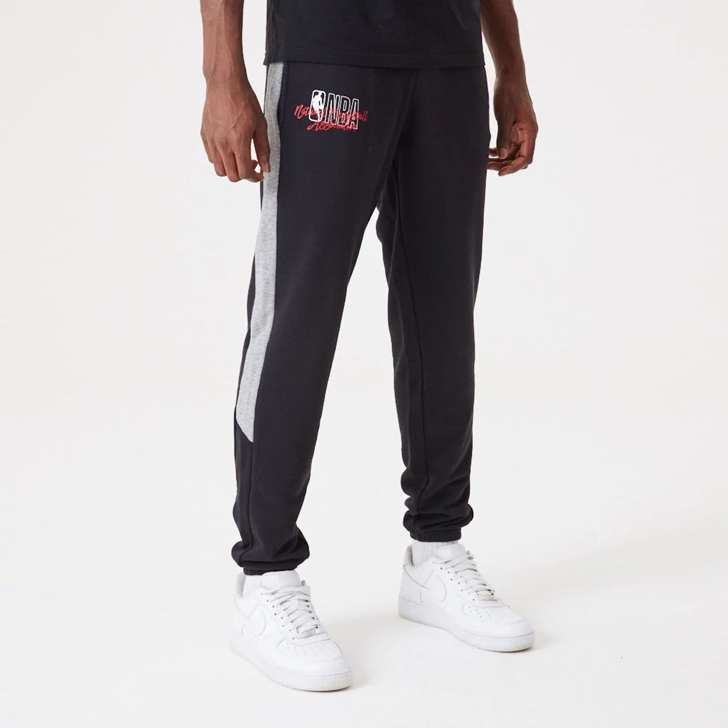 The Male model is wearing NBA Logo Script Black Joggers 1