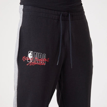 The Male model is wearing NBA Logo Script Black Joggers 4