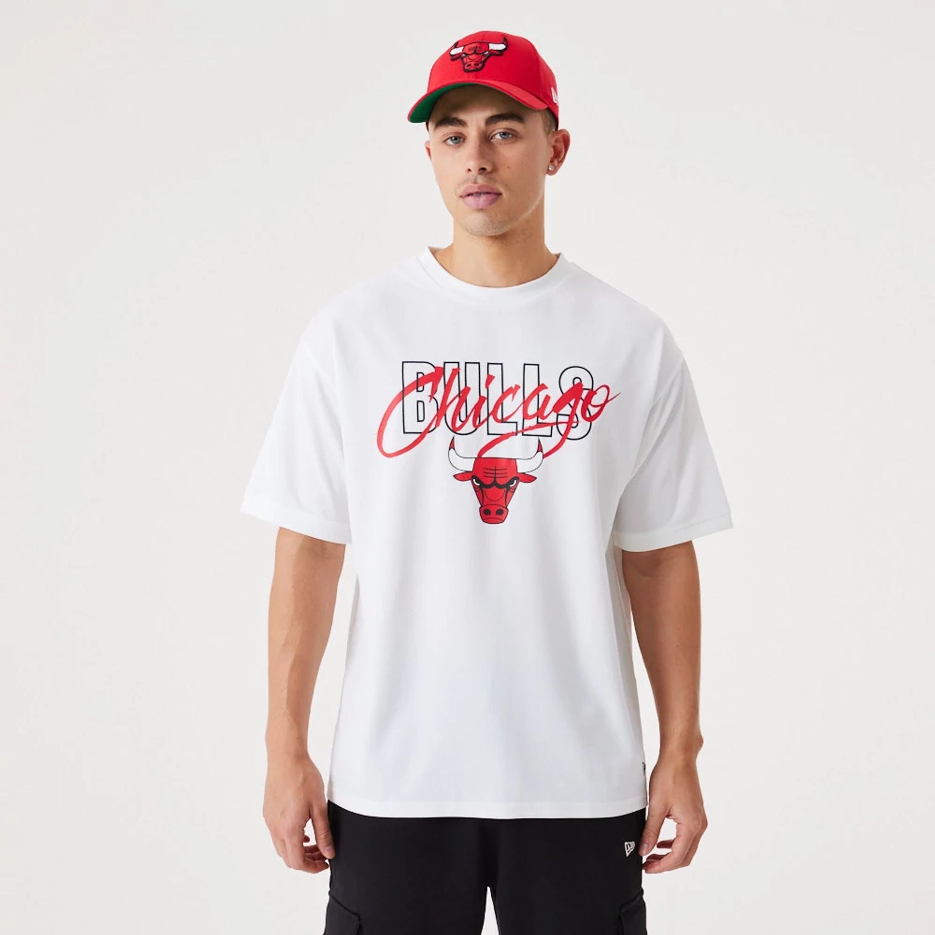 The Male model is wearing Chicago Bulls NBA Script White Oversized T-Shirt 1