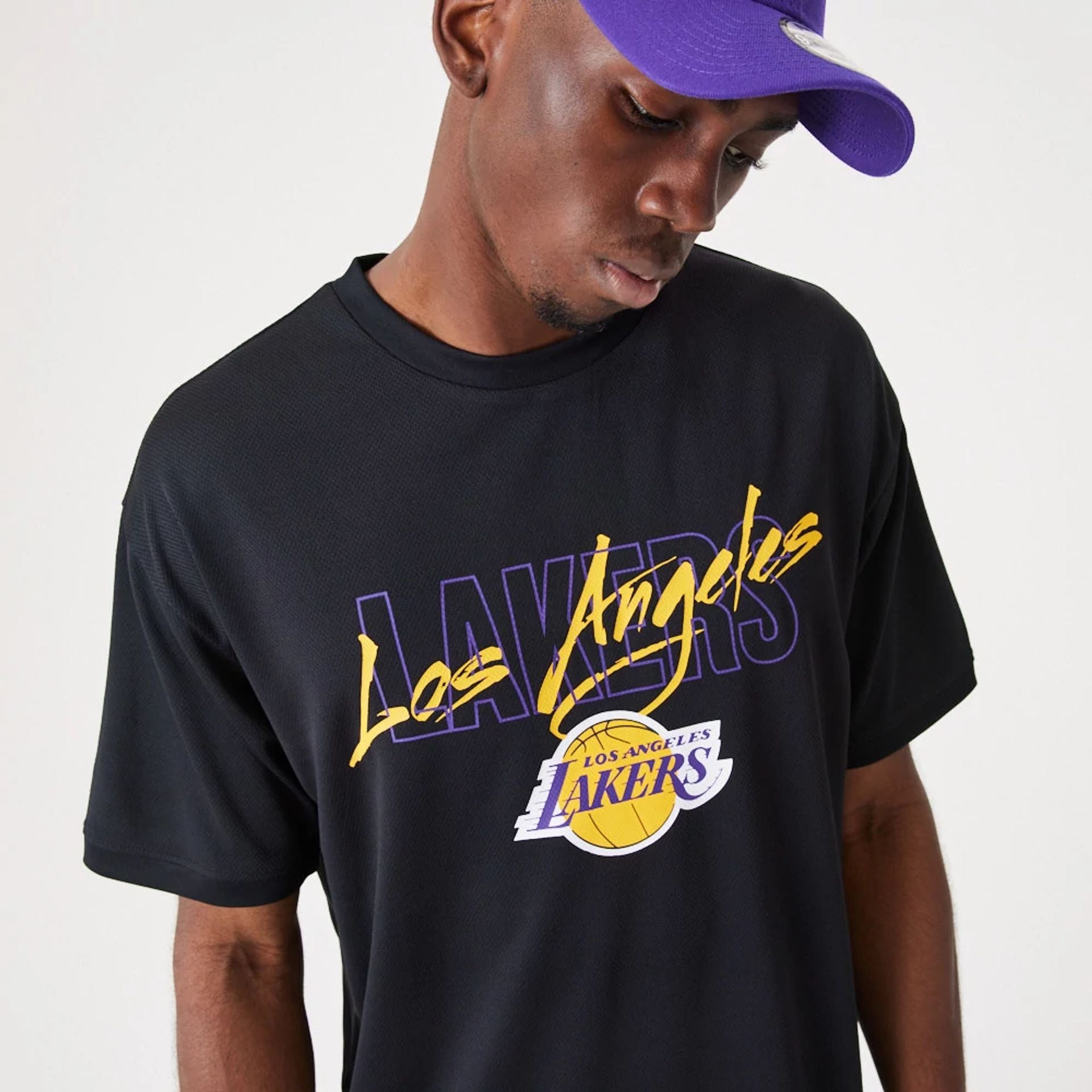 The Male model is wearing LA Lakers NBA Script Black Oversized T-Shirt 2