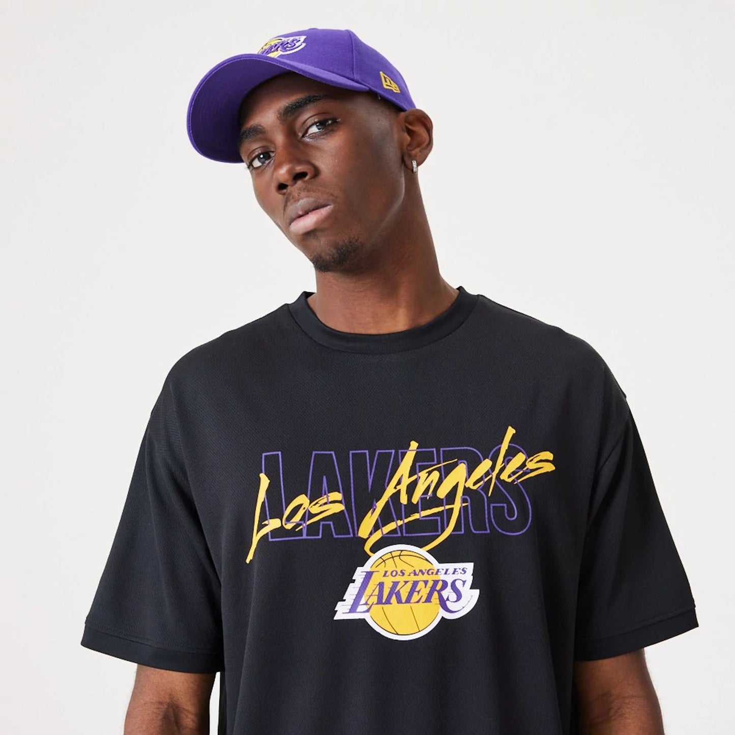 The Male model is wearing LA Lakers NBA Script Black Oversized T-Shirt 3