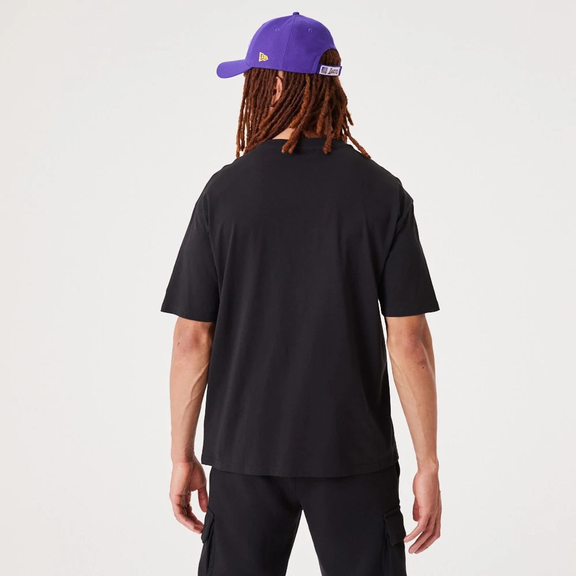 The Male model is wearing LA Lakers NBA Drip Logo Black T-Shirt 2