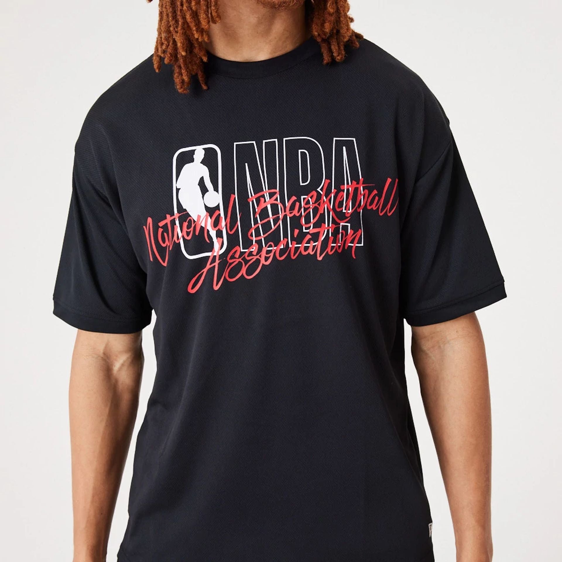 The Male model is wearing NBA Logo Script Black Oversized T-Shirt 5