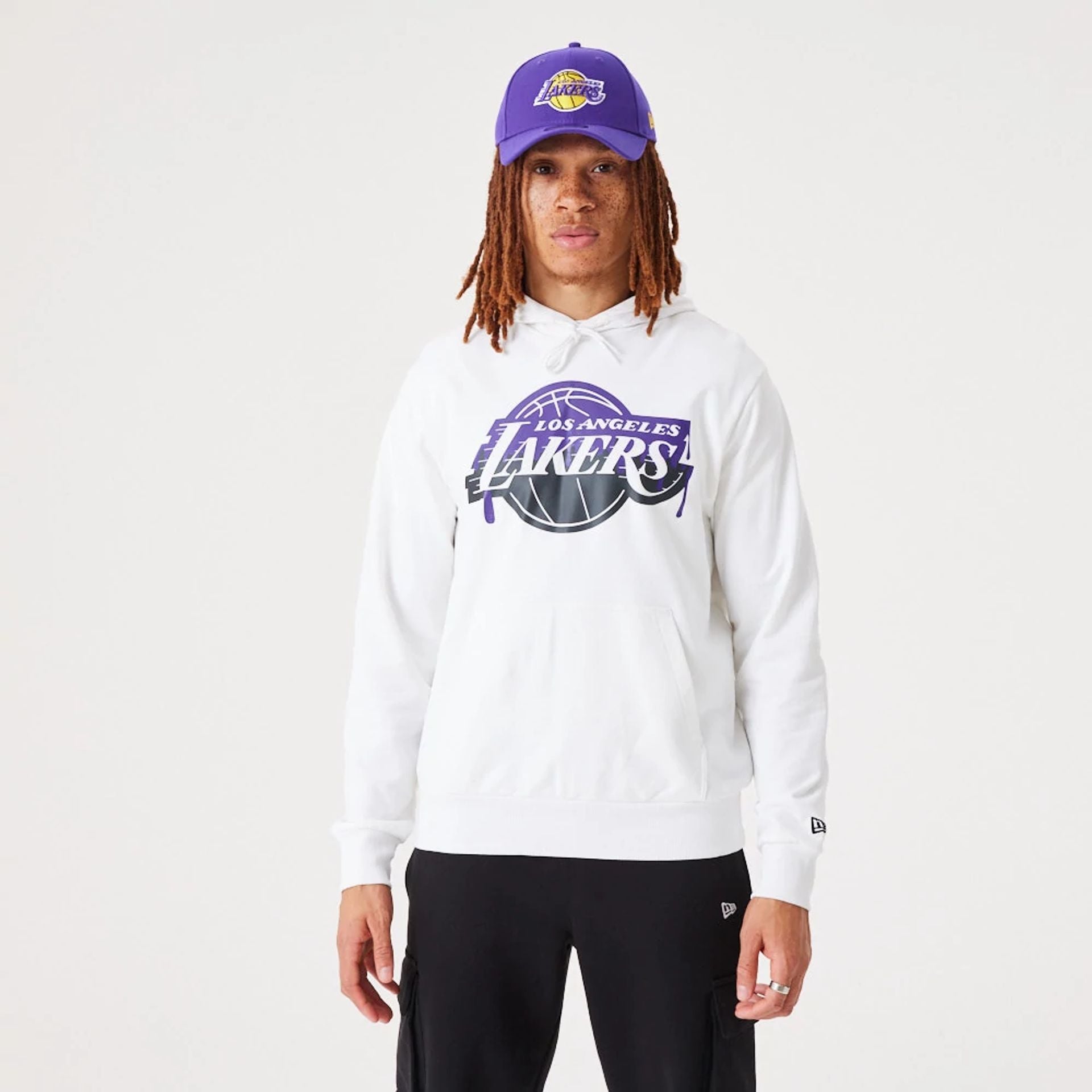 The Male model is wearing LA Lakers NBA Drip Logo White Pullover Hoodie 1