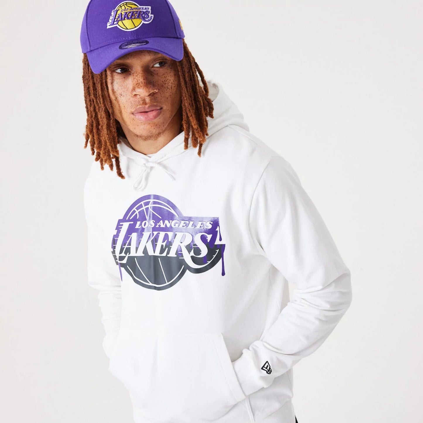 The Male model is wearing LA Lakers NBA Drip Logo White Pullover Hoodie 5