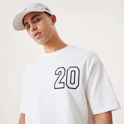 The Male model is wearing New Era Contemporary White Oversized T-Shirt 7