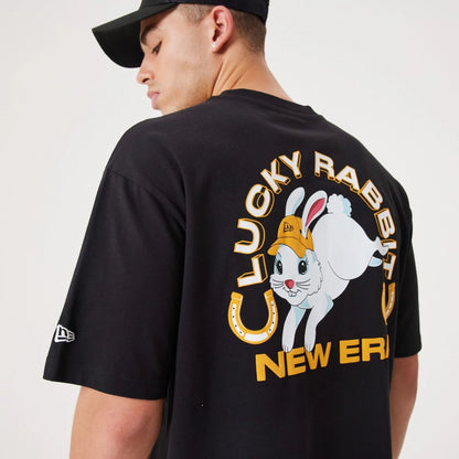 The Male model is wearing New Era Lucky Rabbit Black Oversized T-Shirt 5