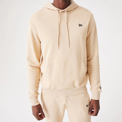 The Male model is wearing New Era Essential Light Beige Pullover Hoodie 5