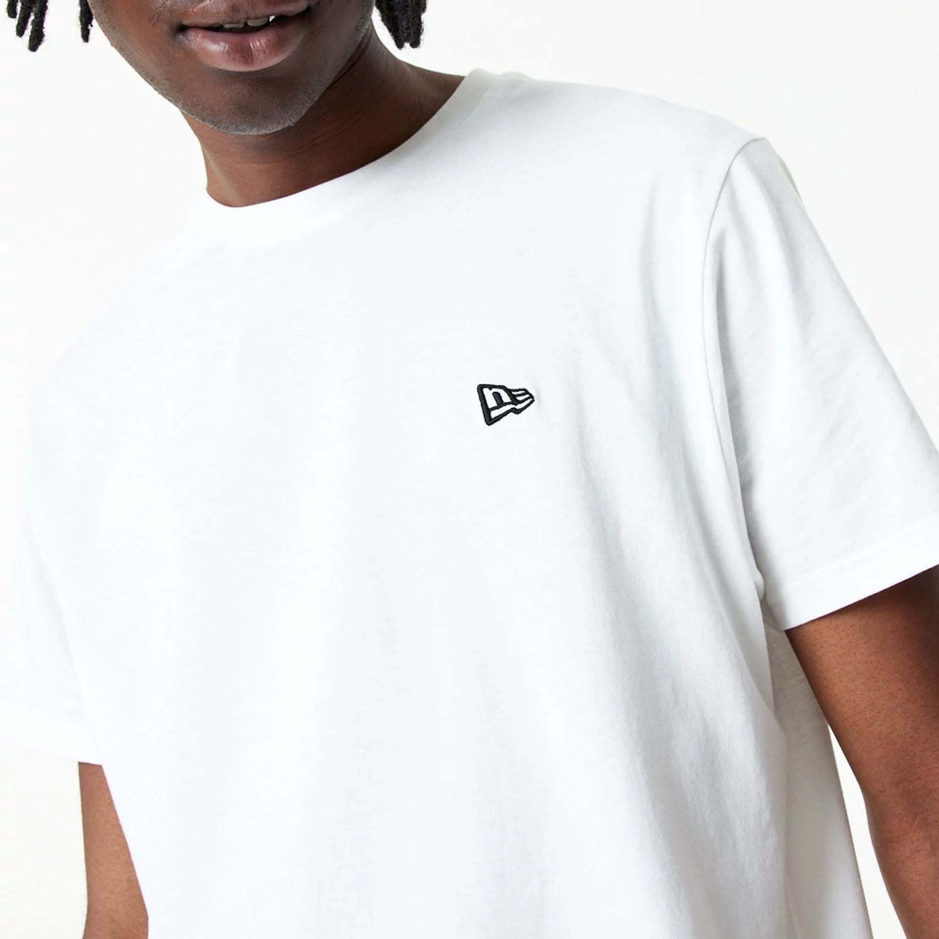 The Male model is wearing New Era Essential Plain White T-Shirt 3