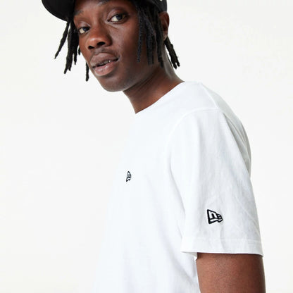 The Male model is wearing New Era Essential Plain White T-Shirt 4