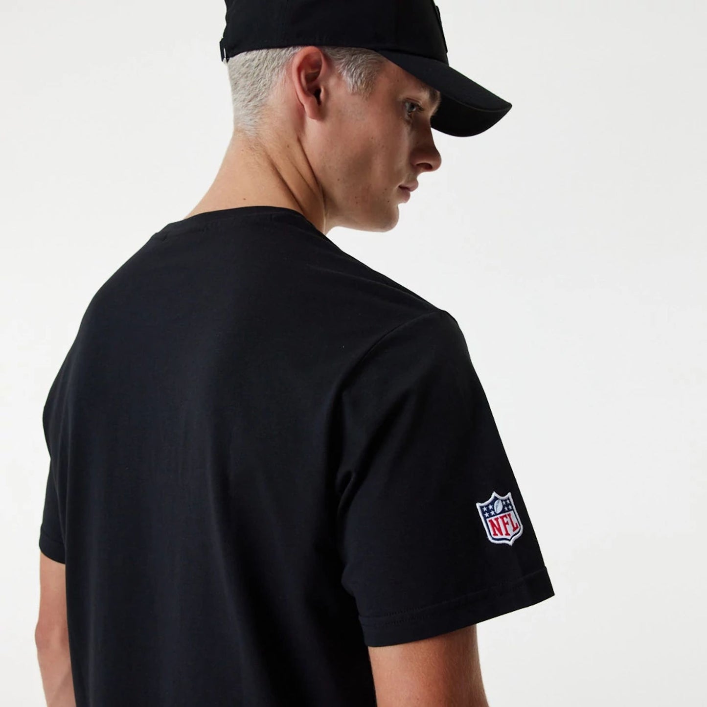 The Male model is wearing NFL Team Graphic Las Vegas Raiders Black T-Shirt 6