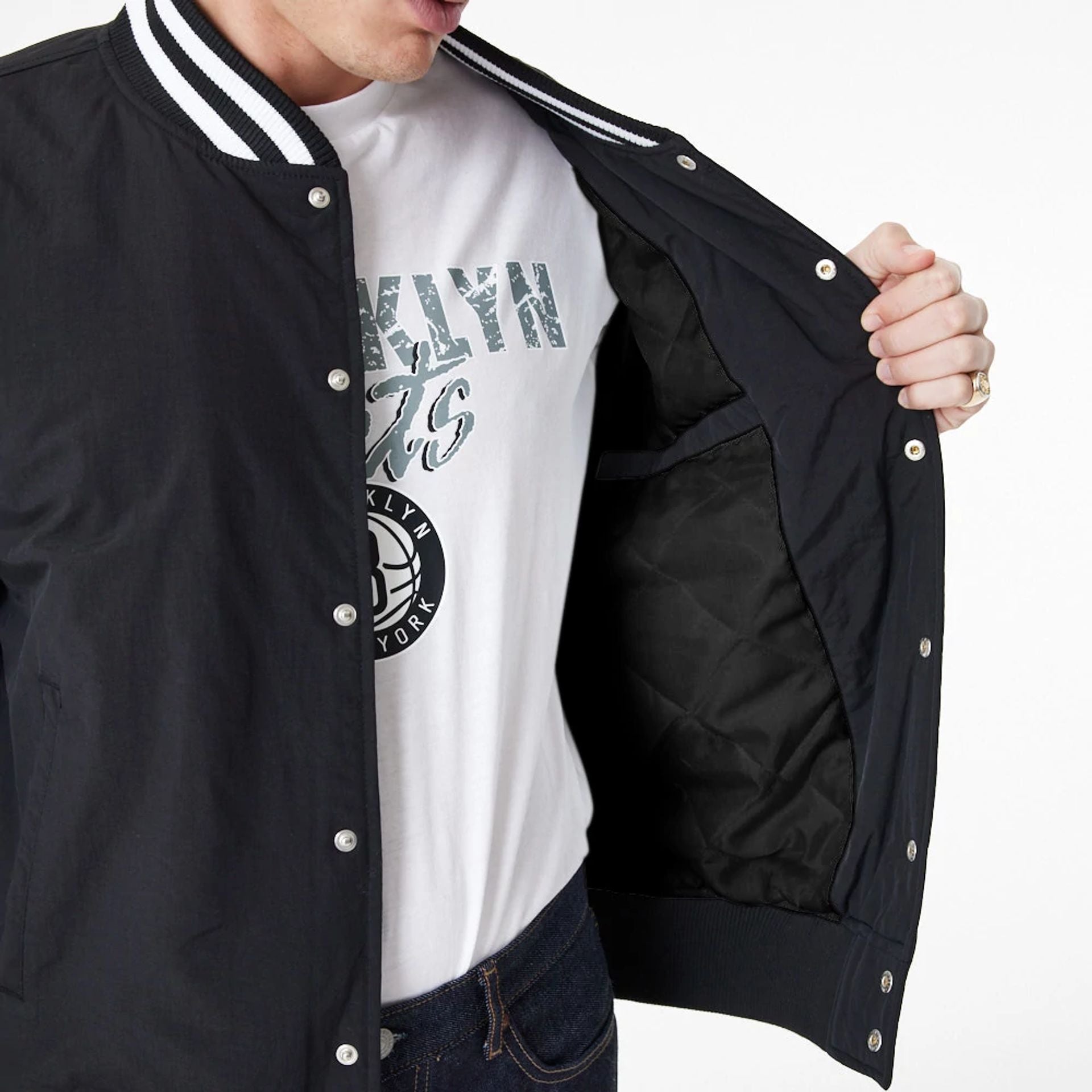 The Male model is wearing Brooklyn Nets Team Script Black Bomber Jacket 4