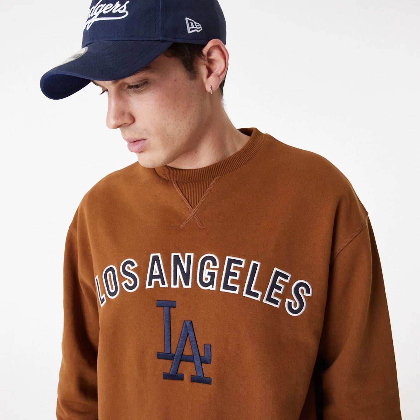 The Male model is wearing LA Dodgers MLB Large Logo Brown Crew Neck Sweatshirt 2