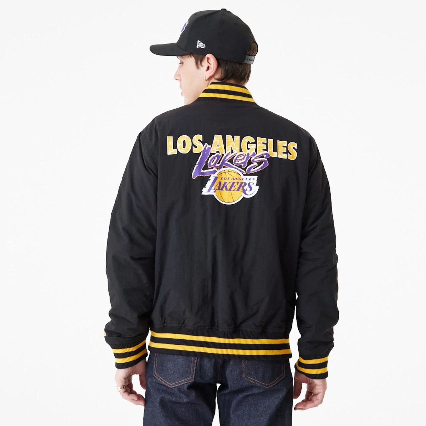 The Male model is wearing LA Lakers Team Script Black Bomber Jacket 3