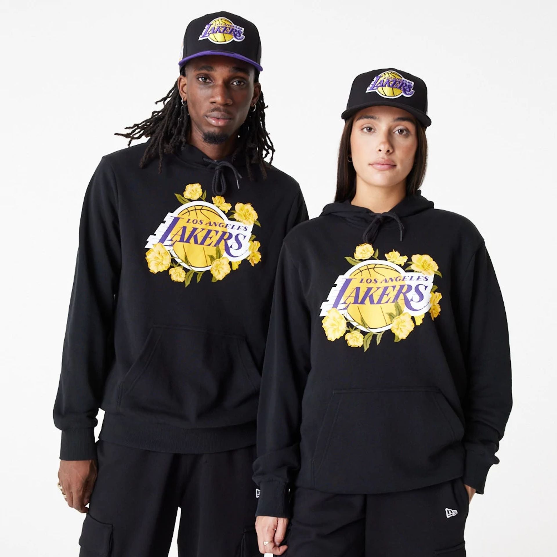 The Male model is wearing LA Lakers NBA Floral Graphic Black Pullover Hoodie 1