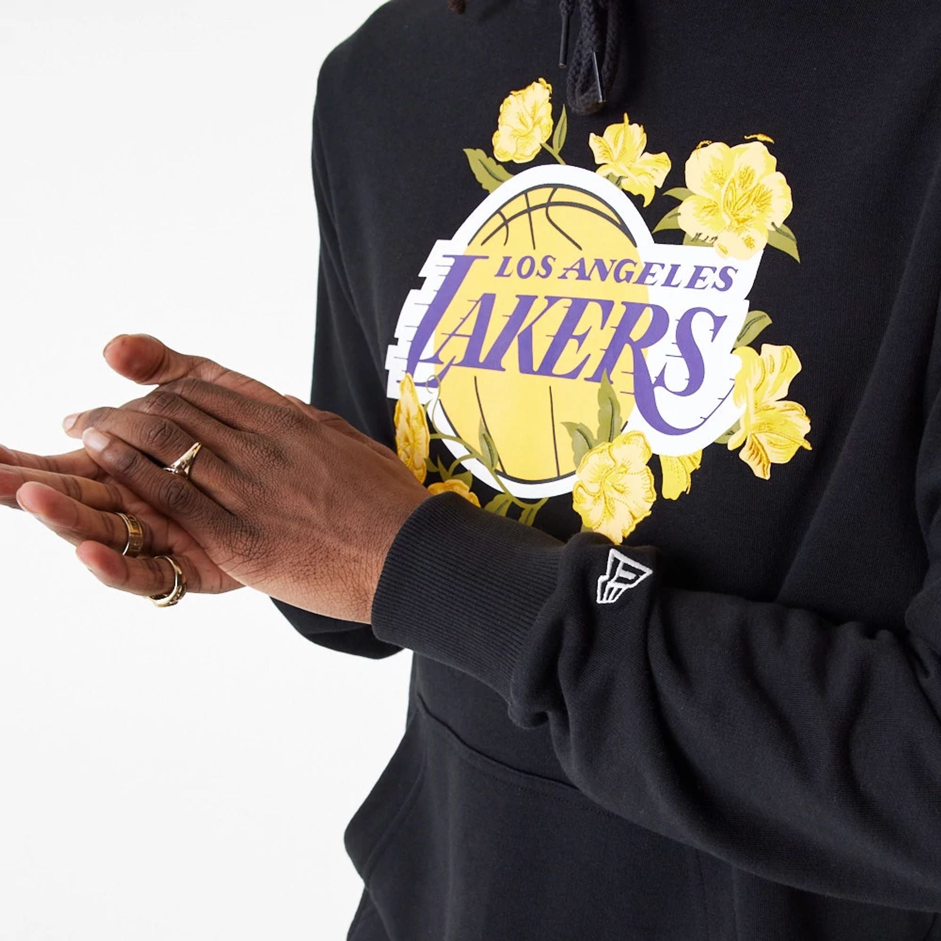 The Male model is wearing LA Lakers NBA Floral Graphic Black Pullover Hoodie 3