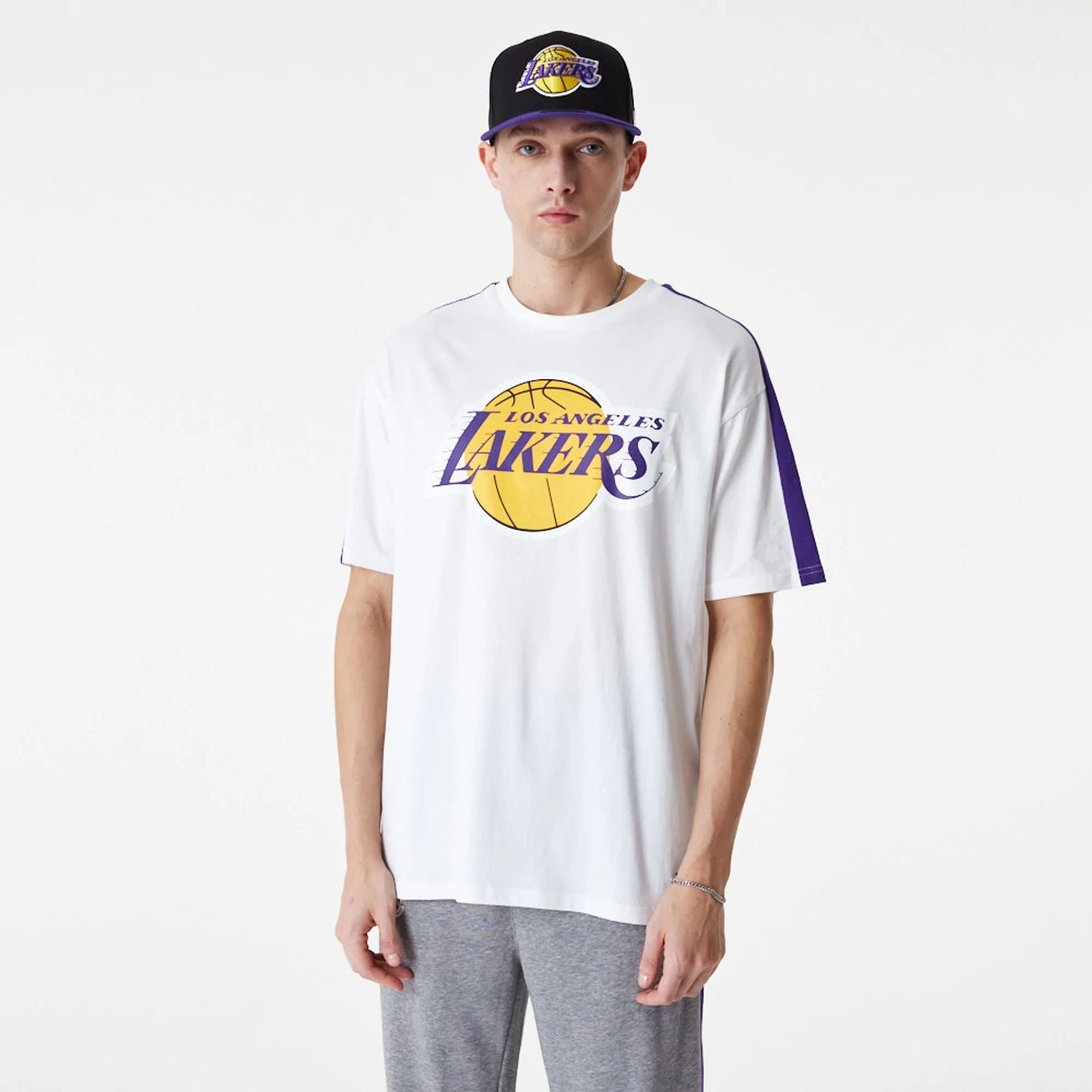 The Male model is wearing LA Lakers NBA Colour Block White Oversized T-Shirt 1