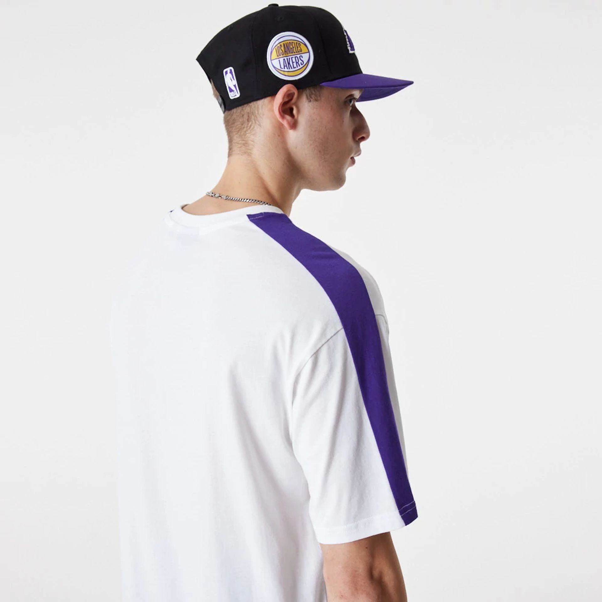 The Male model is wearing LA Lakers NBA Colour Block White Oversized T-Shirt 4