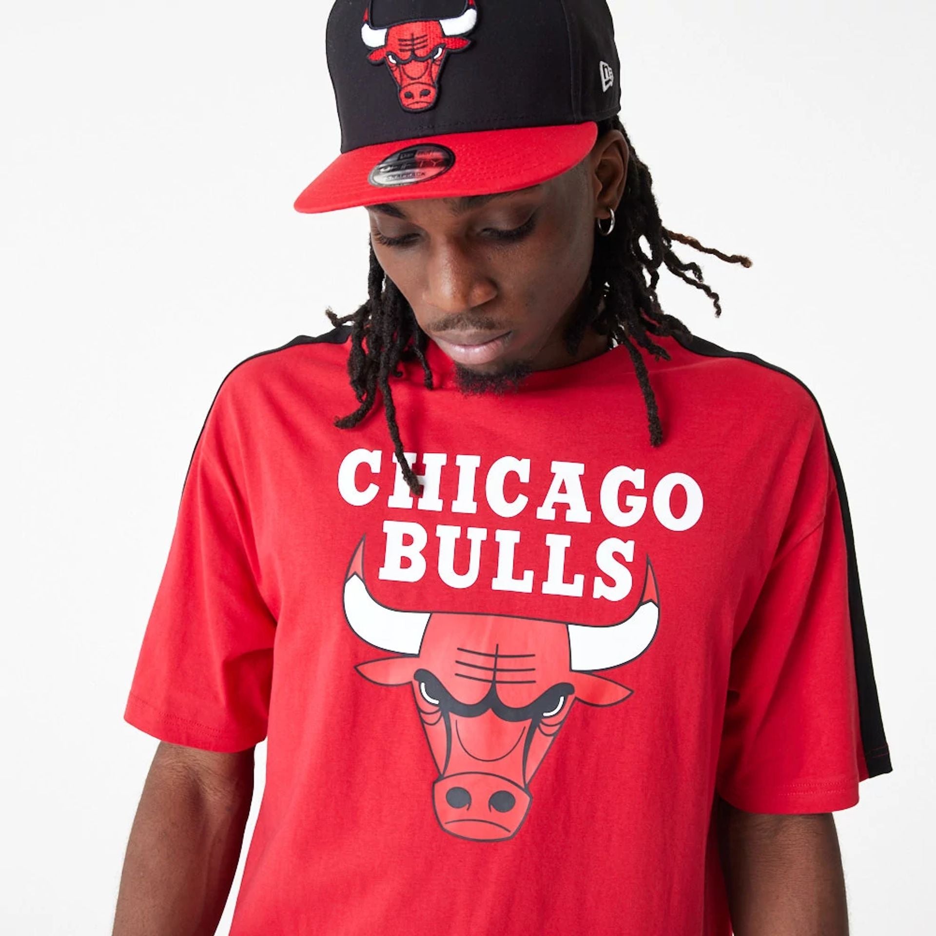 The Male model is wearing Chicago Bulls NBA Colour Block Red Oversized T-Shirt 2