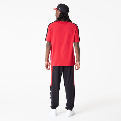 The Male model is wearing Chicago Bulls NBA Colour Block Red Oversized T-Shirt 3