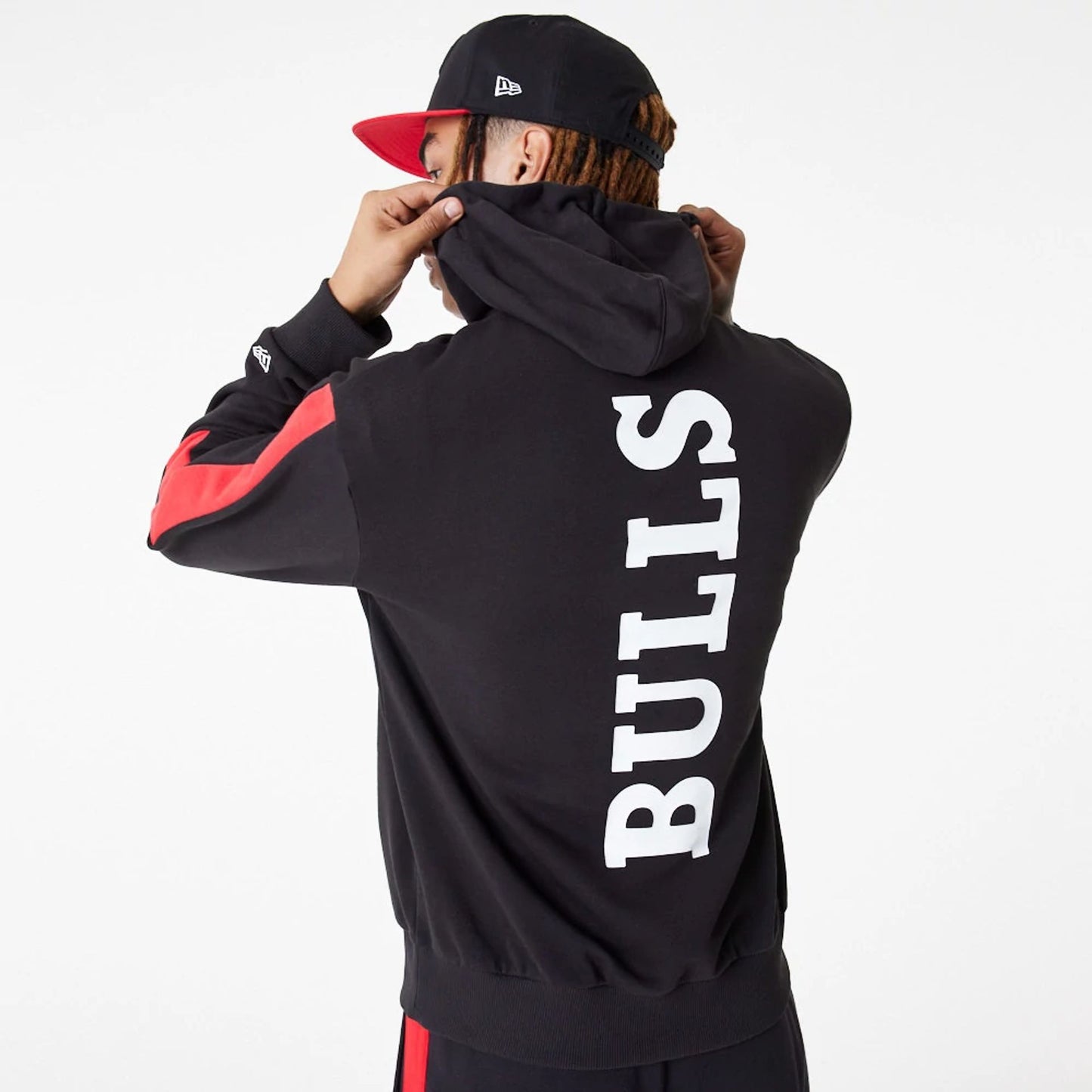 The Male model is wearing Chicago Bulls NBA Colour Block Black Pullover Hoodie 4