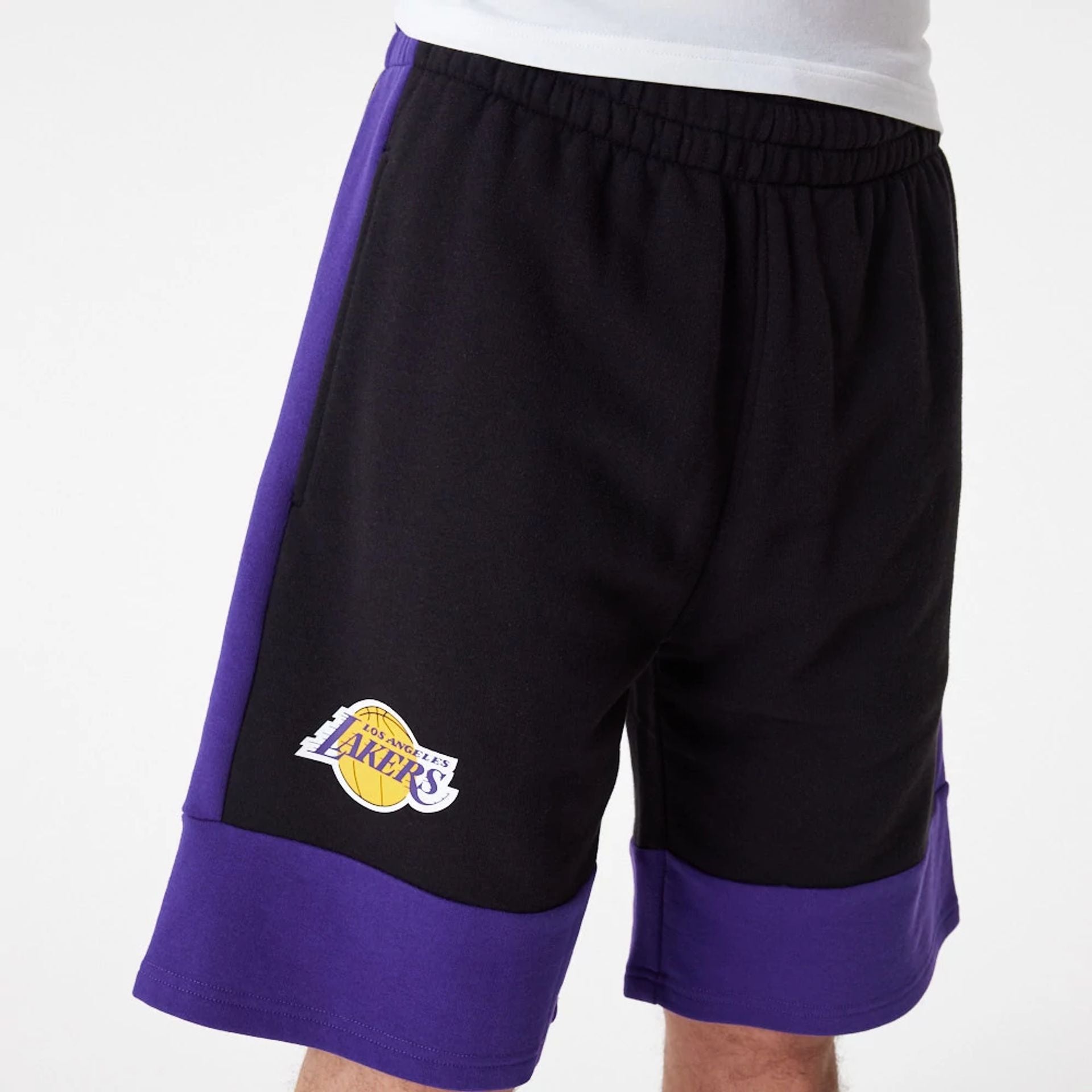 The Male model is wearing LA Lakers NBA Colour Block Black Shorts 1