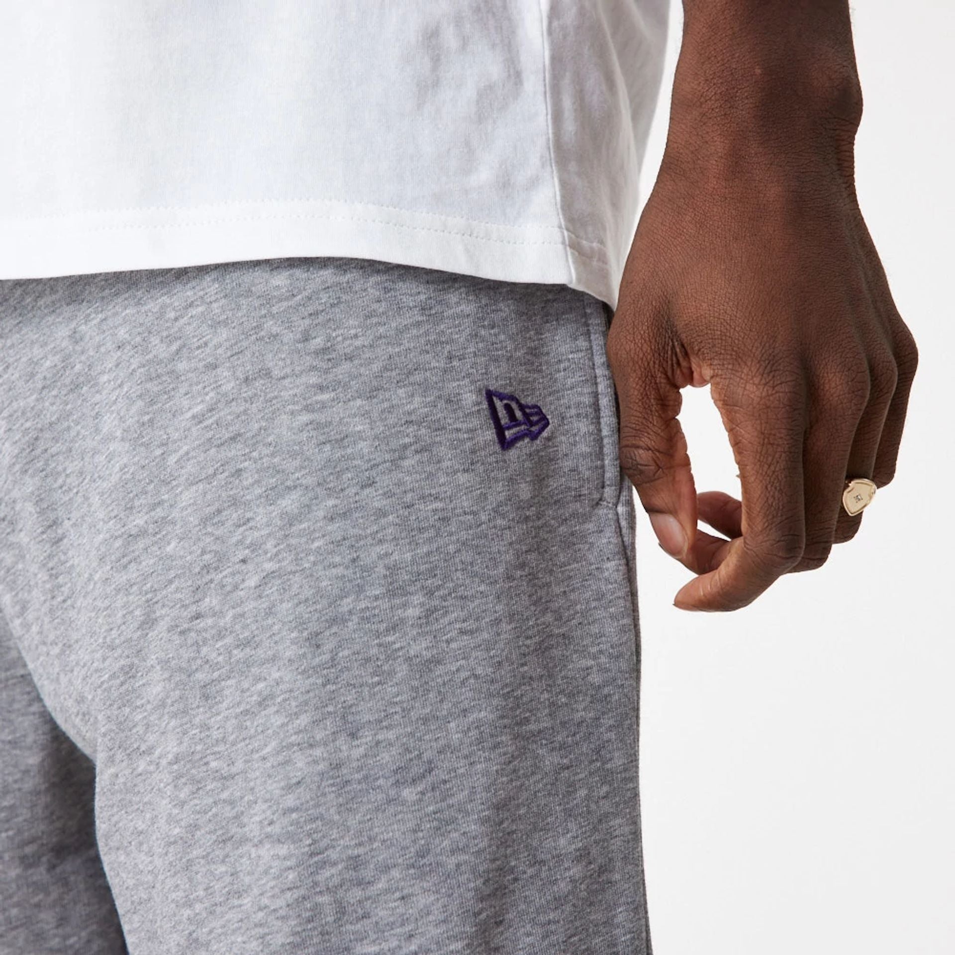 The Male model is wearing LA Lakers Team Script Grey Shorts 2