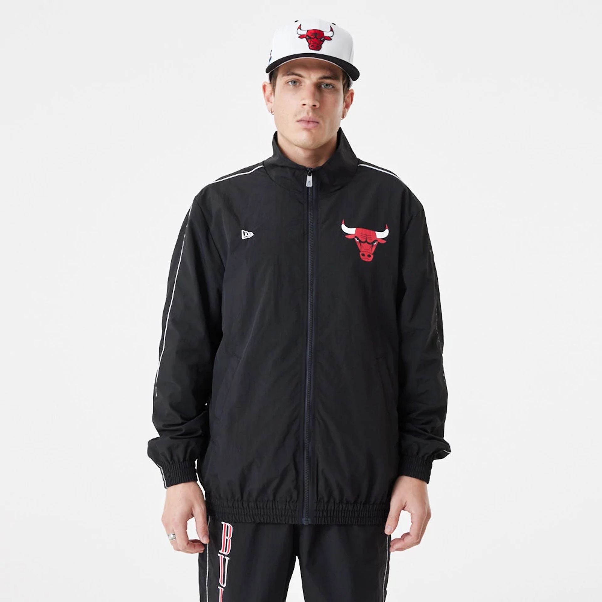 The Male model is wearing Chicago Bulls NBA Lifestyle Black Track Jacket 1