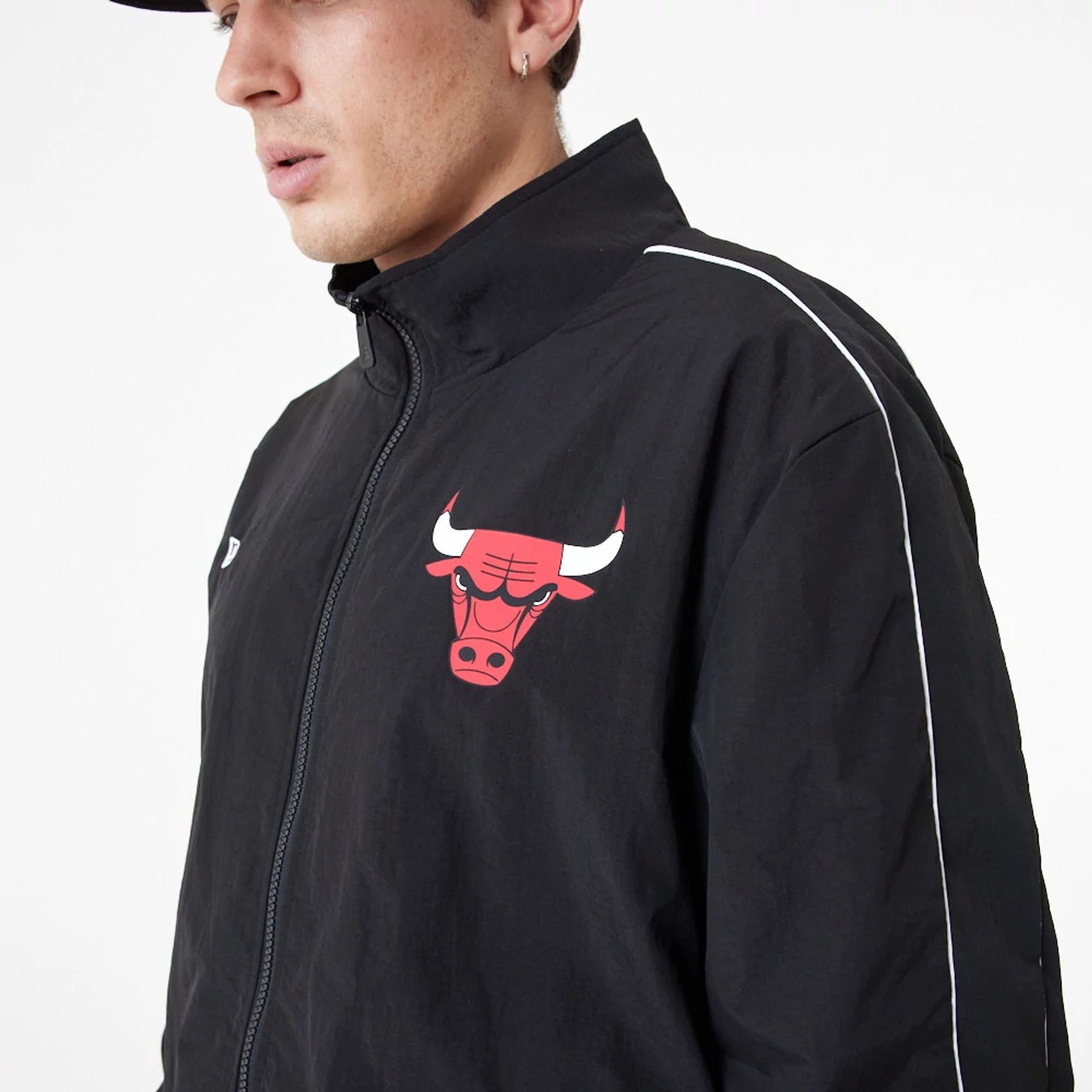 The Male model is wearing Chicago Bulls NBA Lifestyle Black Track Jacket 4