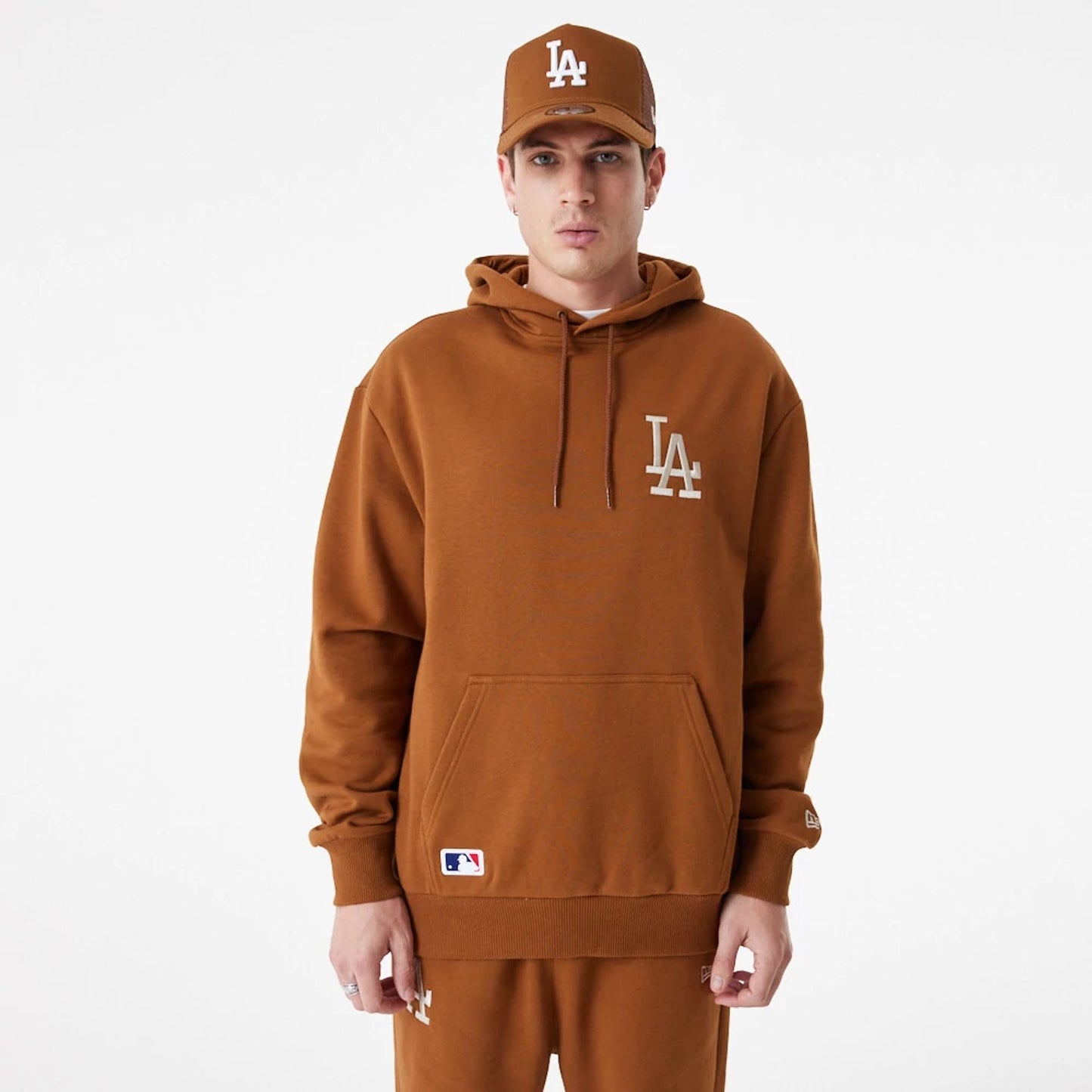 The Male model is wearing LA Dodgers League Essential Oversized Brown Hoodie 2