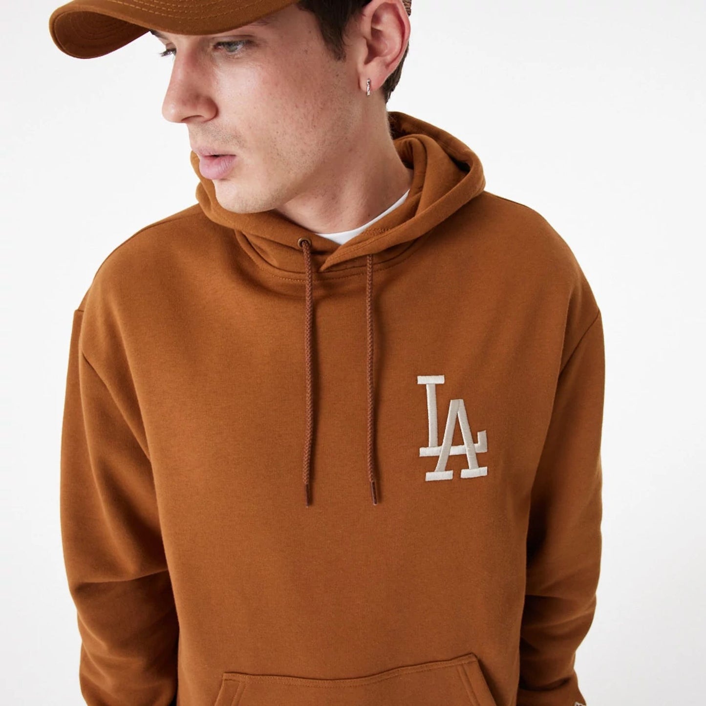 The Male model is wearing LA Dodgers League Essential Oversized Brown Hoodie 4