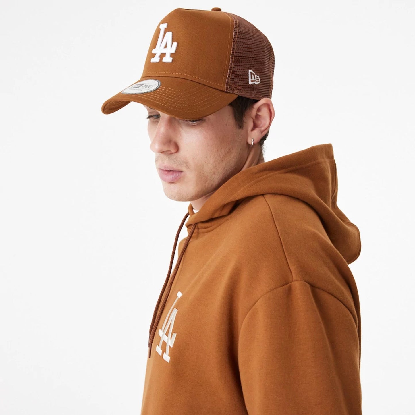 The Male model is wearing LA Dodgers League Essential Oversized Brown Hoodie 9