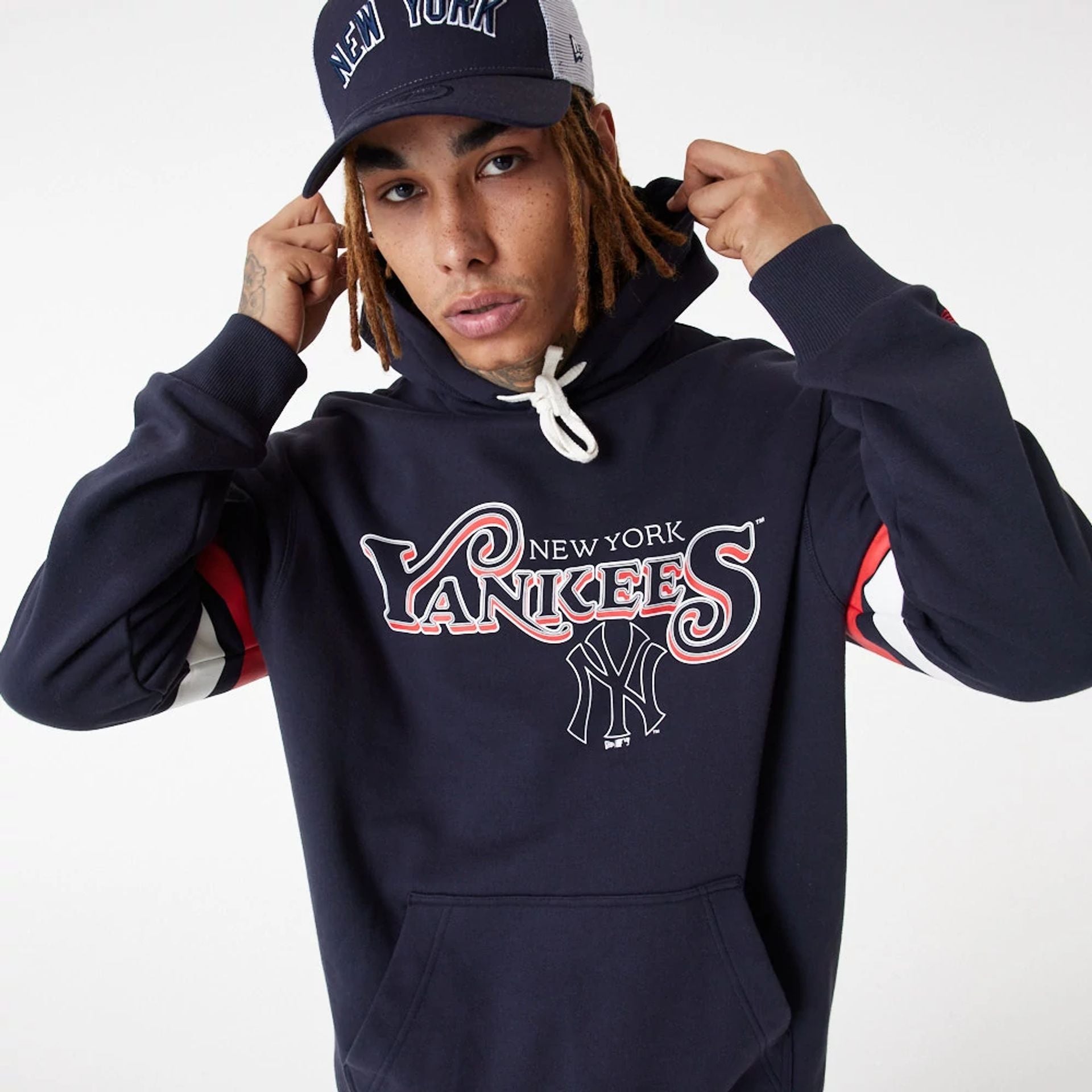 The Male model is wearing New York Yankees MLB Retro Graphic Navy Hoodie 2