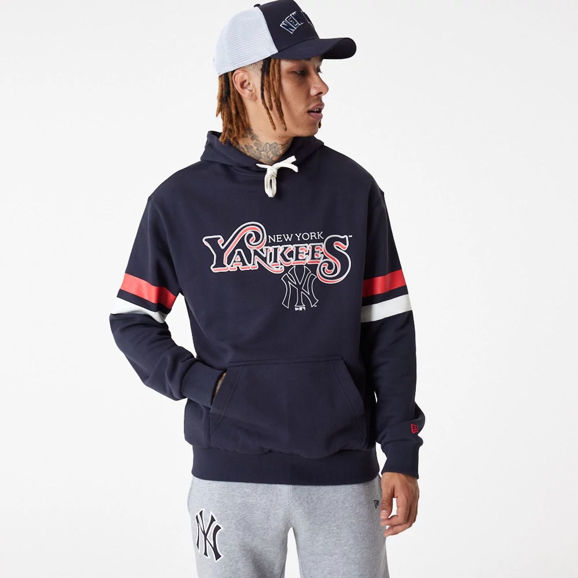 The Male model is wearing New York Yankees MLB Retro Graphic Navy Hoodie 1