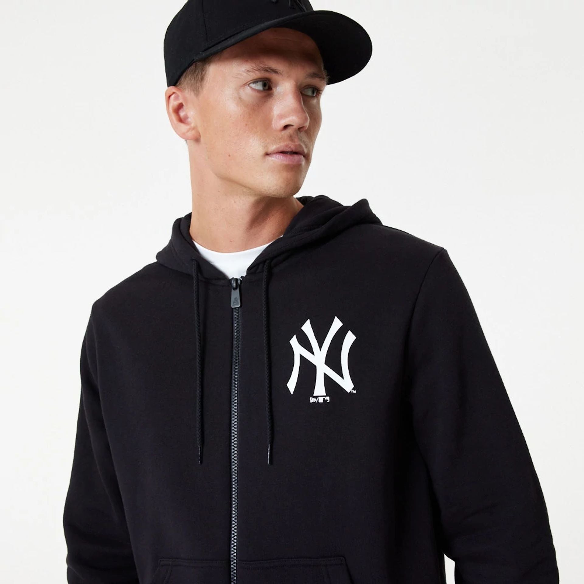 The Male model is wearing New York Yankees MLB Essential Black Full Zip Hoodie 1