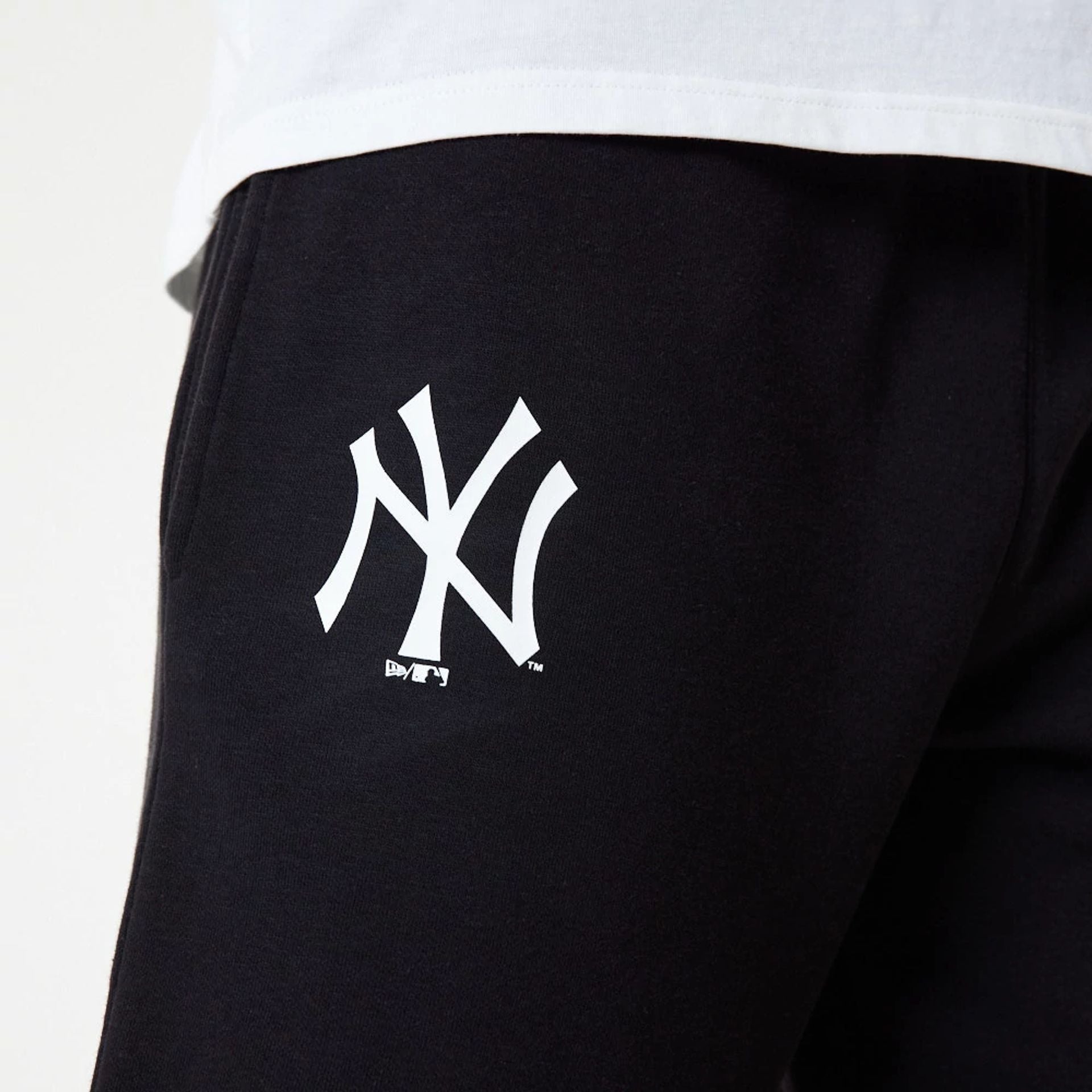 The Male model is wearing New York Yankees MLB Essential Black Joggers 5