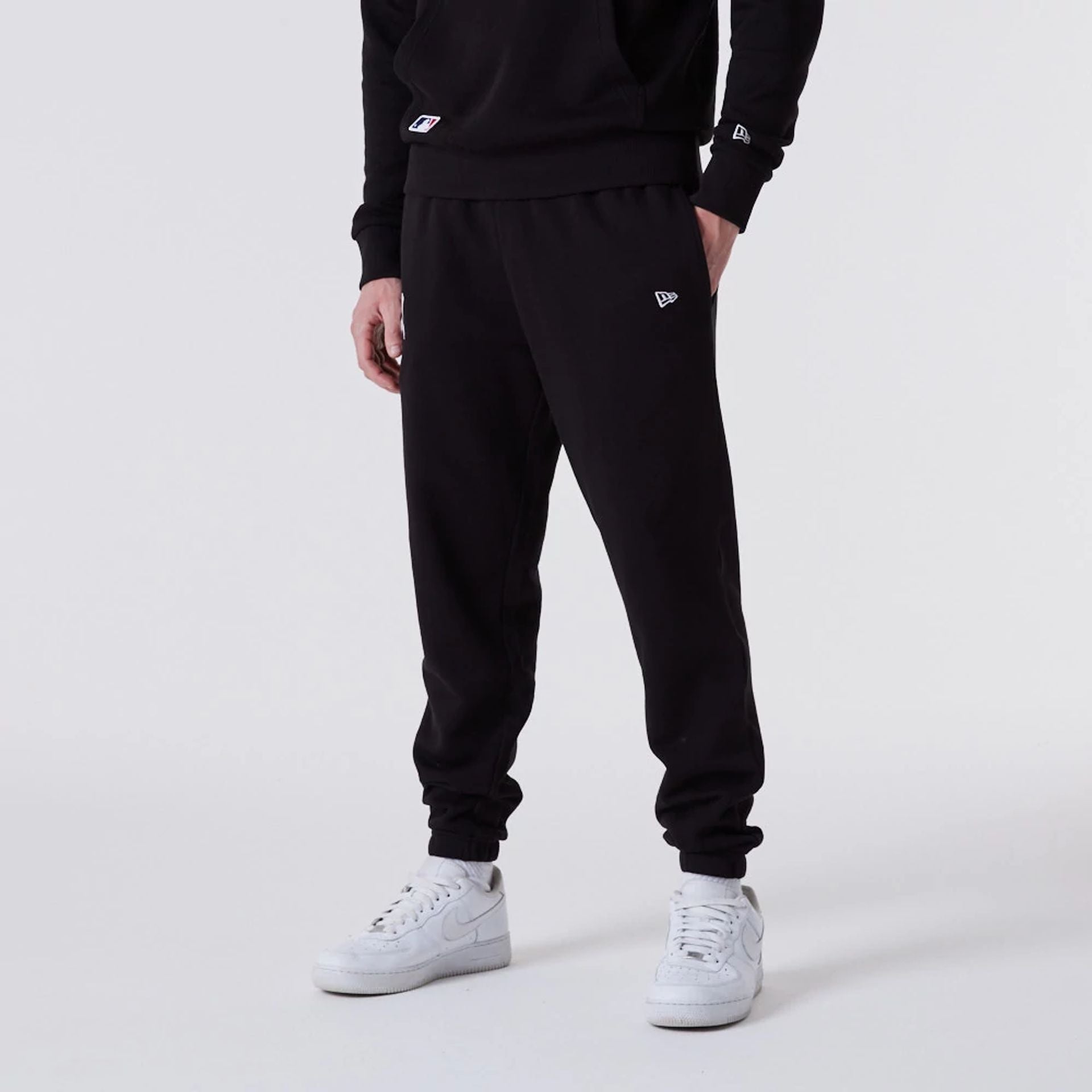 The Male model is wearing New York Yankees MLB Essential Black Joggers 7