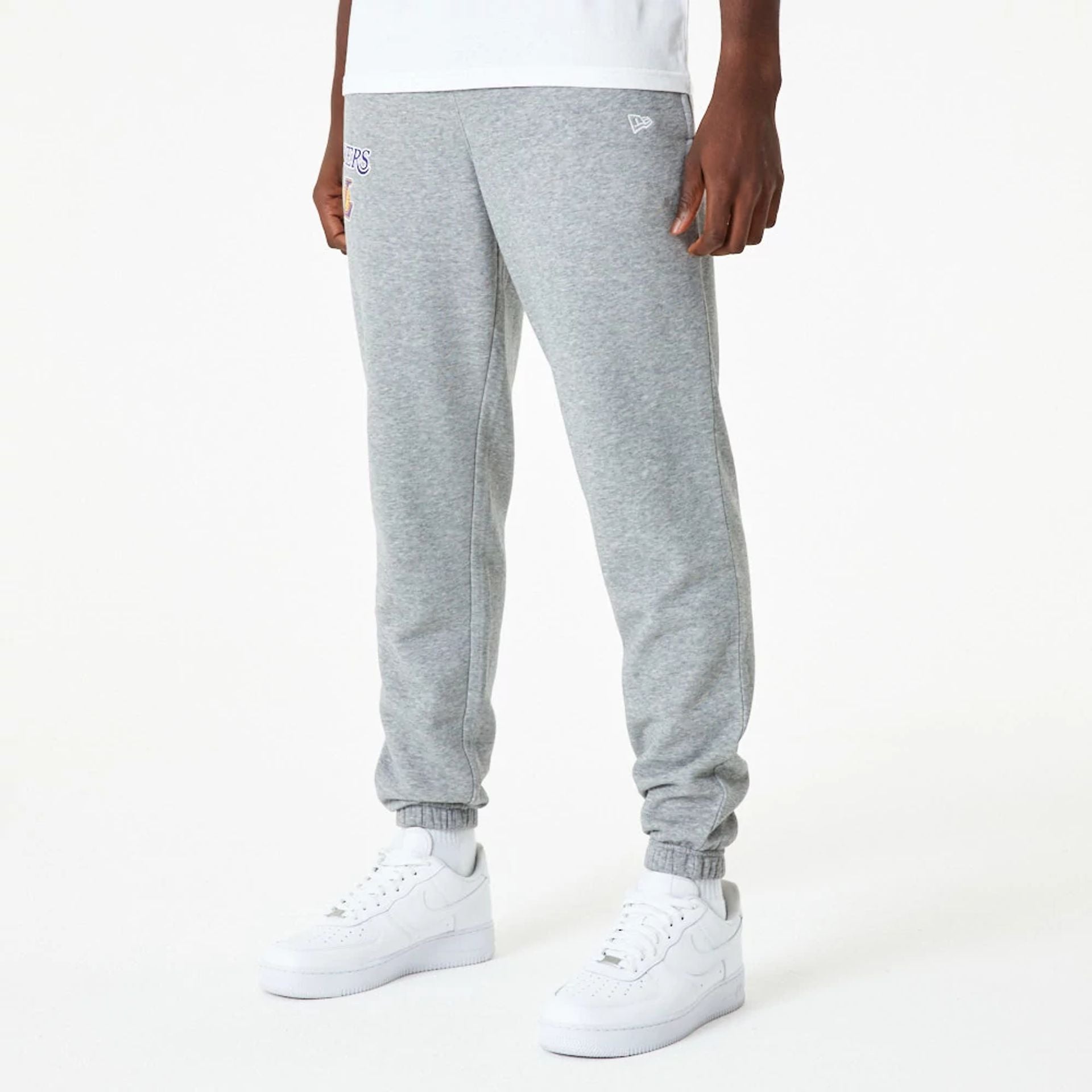 The Male model is wearing LA Lakers NBA Essential Grey Joggers 2