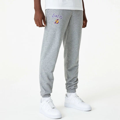 The Male model is wearing LA Lakers NBA Essential Grey Joggers 1