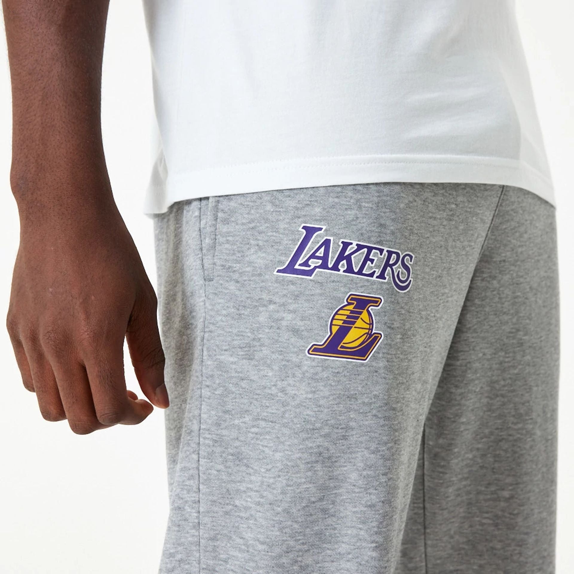 The Male model is wearing LA Lakers NBA Essential Grey Joggers 5