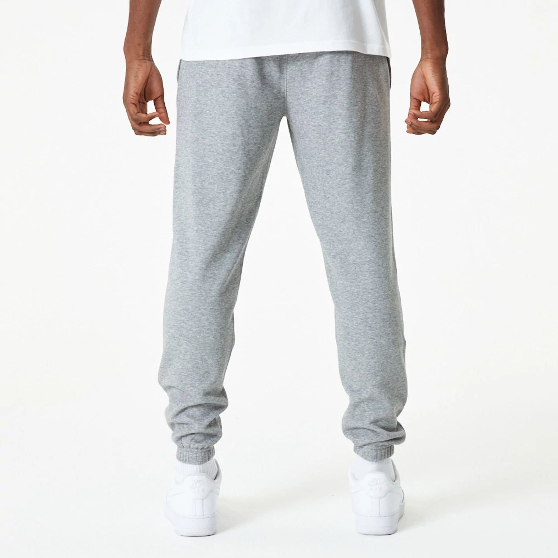 The Male model is wearing LA Lakers NBA Essential Grey Joggers 7