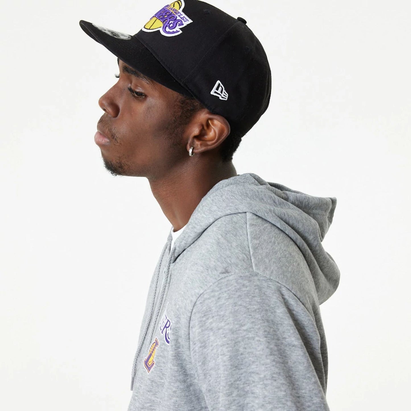 The Male model is wearing LA Lakers NBA Essential Grey Full Zip Hoodie 4