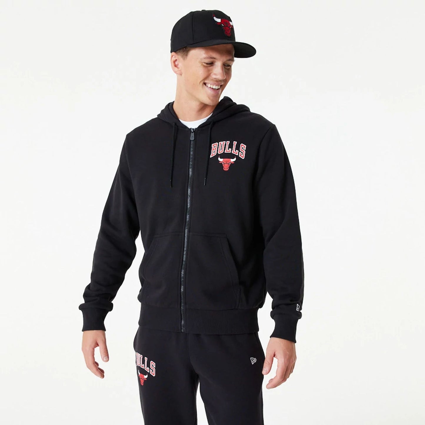 The Male model is wearing Chicago Bulls NBA Essential Black Full Zip Hoodie 1